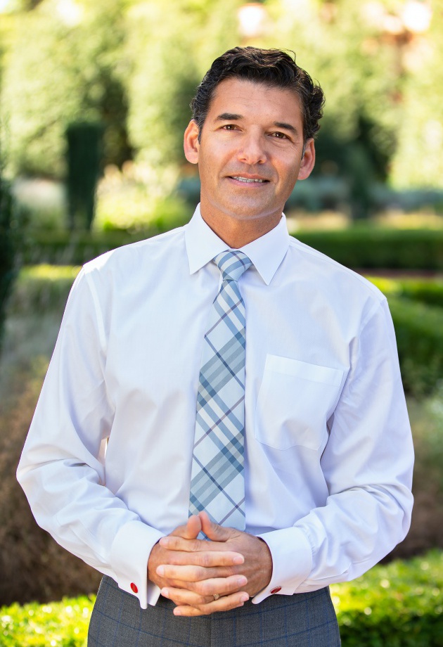 Professional photograph of Dr. Damion Martins